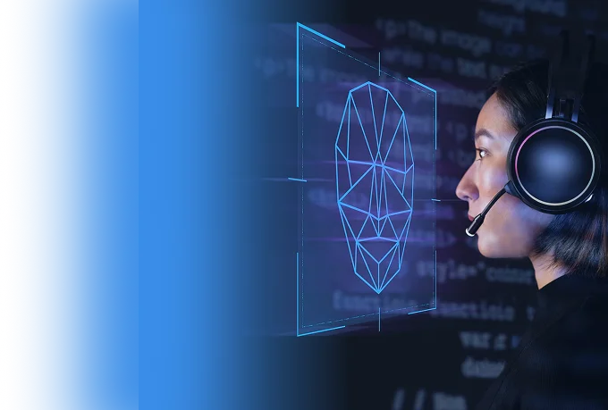 Woman wearing a headset facing a holographic wireframe face over lines of code